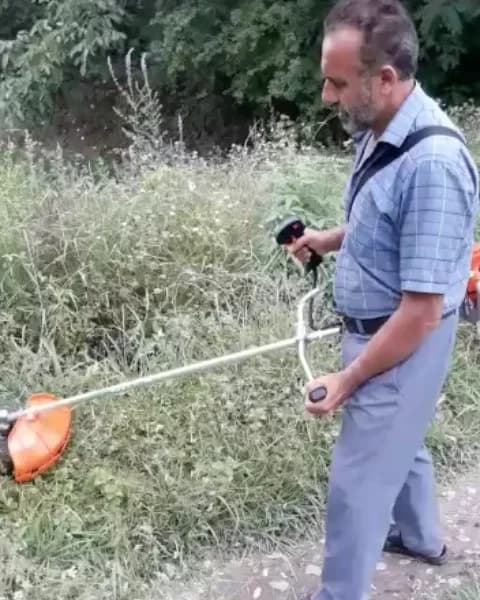 علفزن بنزینی ۵۲ سیسی ایکار، رنگ نارنجی و نقرهای، جنس فلز و پلاستیک، دستی، بلند