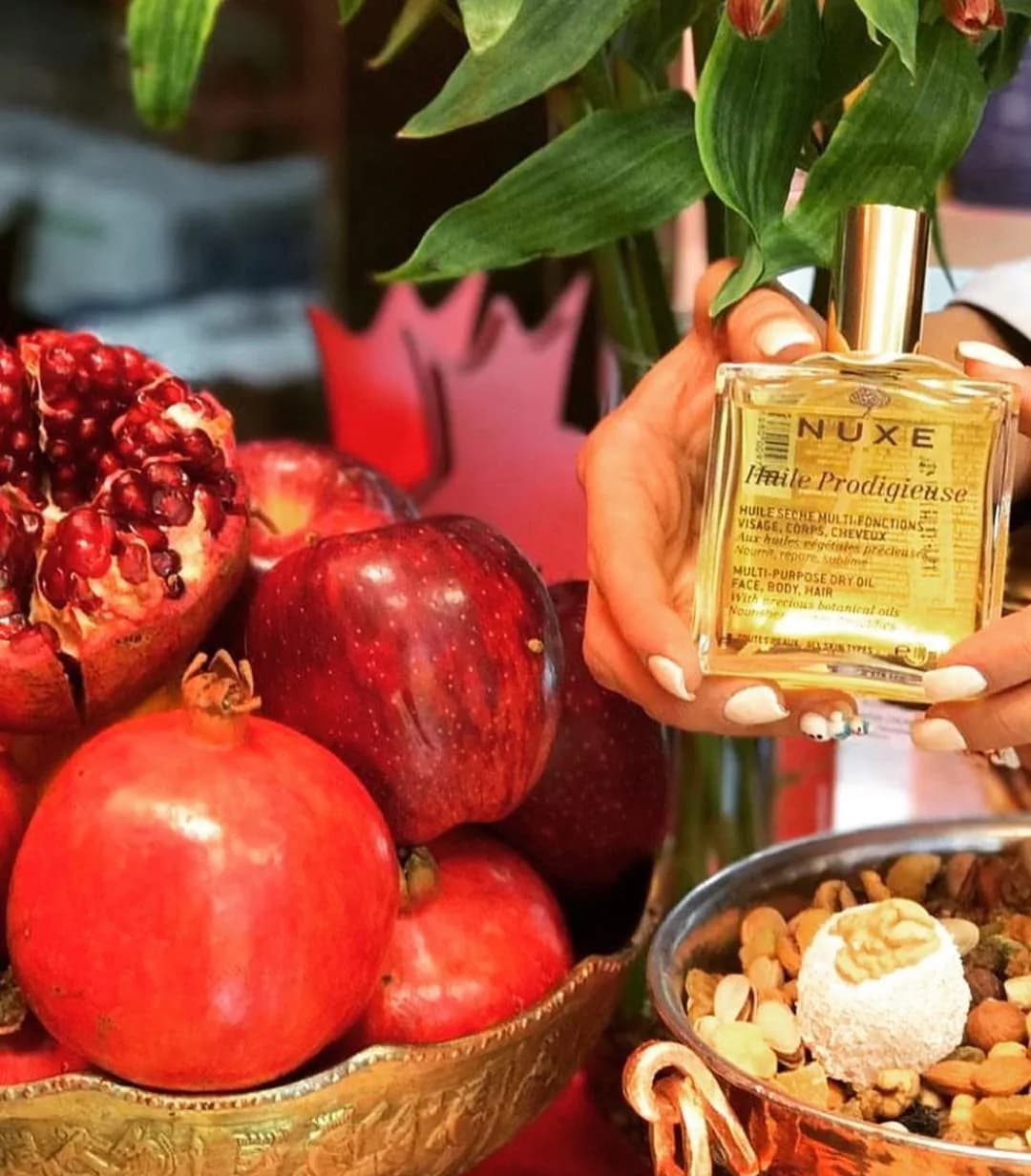 روغن پردیژیوز بدن و مو نوکس، رنگ زرد و طلایی، جنس شیشه، بطری مستطیلی