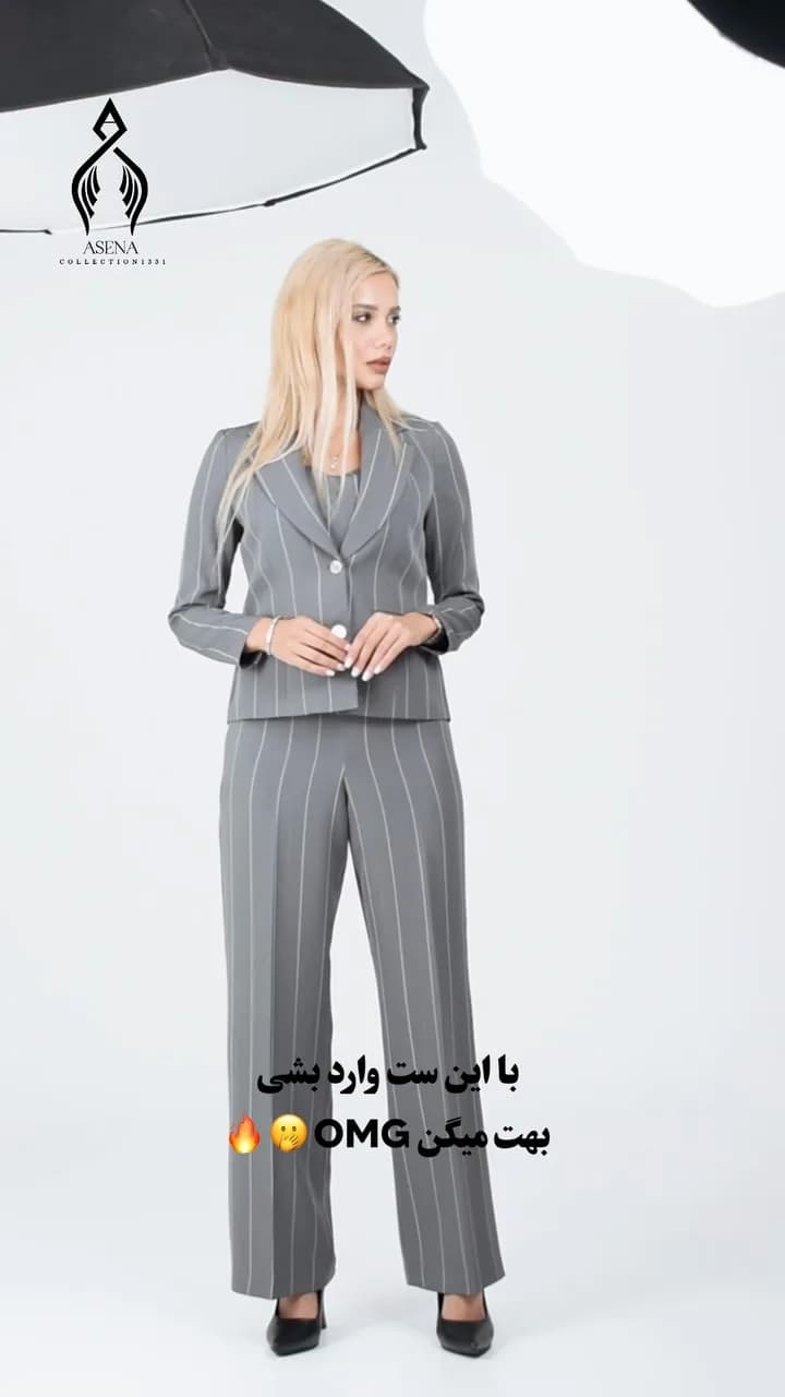 کت‌وشلوار زنانه راه‌راه، رنگ خاکستری، کت دکمه‌دار، آستین بلند، شلوار گشاد