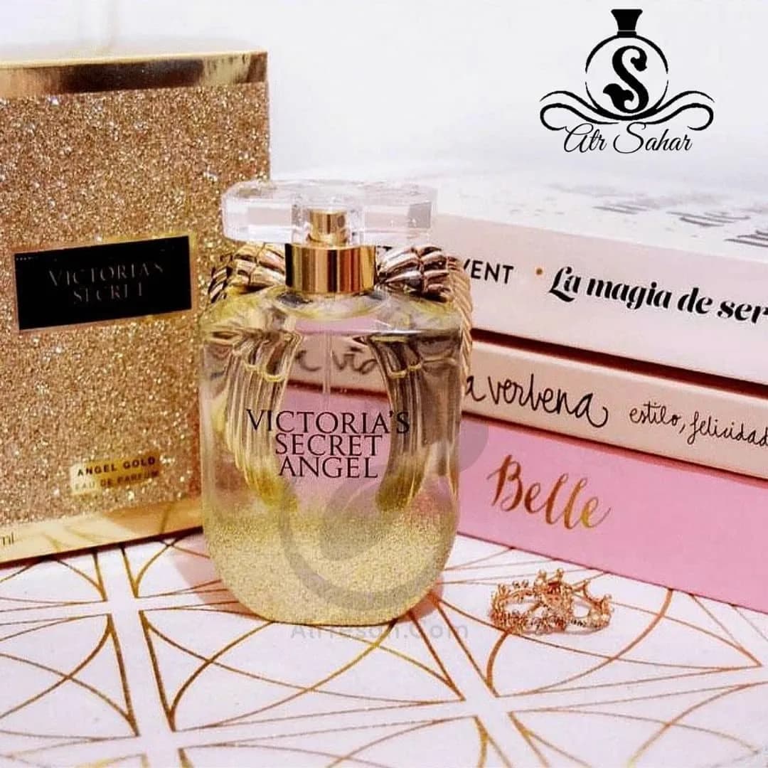 عطر آنجل گلد ویکتوریا سکرت، رنگ طلایی و شفاف، جنس شیشه و فلز، شیشه‌ای، درپوش شفاف