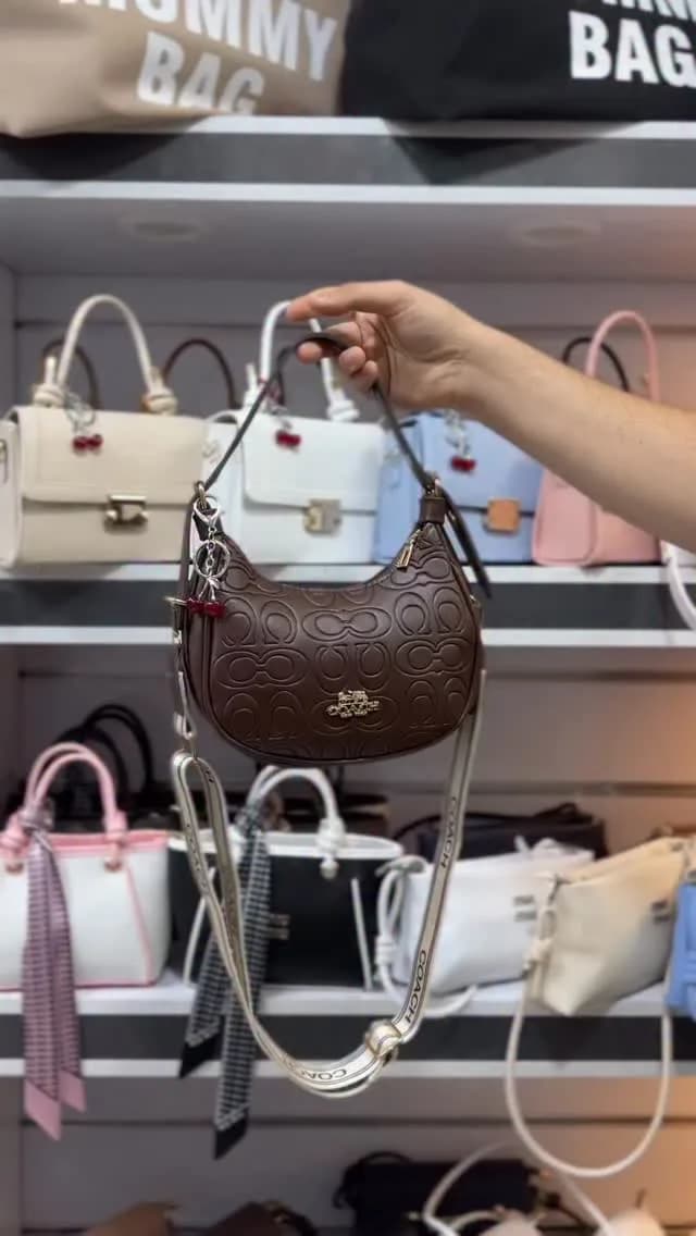 کیف کوکی، رنگ قهوه‌ای، جنس چرم، دوشی، نیم دایره