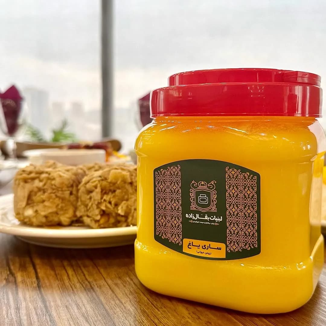 روغن حیوانی ساری یاغ، رنگ زرد، قوطی استوانهای، درِ قرمز