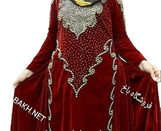 پیراهن محلی زنانه مدل ۱۴۸، رنگ قرمز، سفید و طلایی، جنس مخمل، طرح گلدوزی، بلند، آستینبلند، گشاد