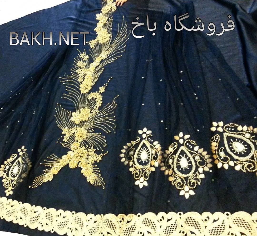 پارچه لباس محلی لری مدل ۱۴۰، رنگ سورمهای و طلایی، جنس حریر، طرح گلدوزی، پارچه کارشده زنانه