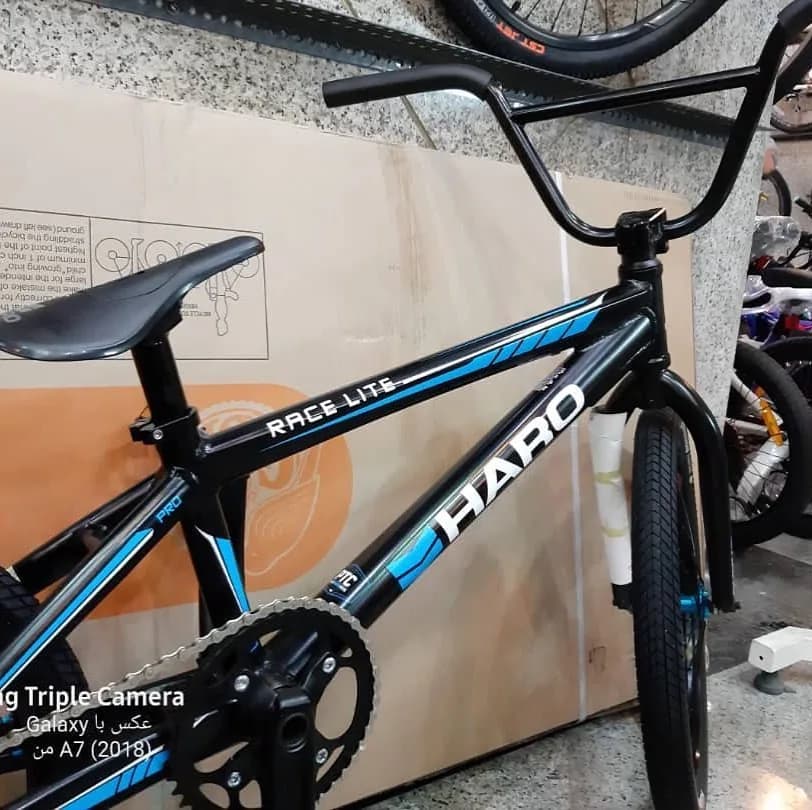 دوچرخه BMX مدل ریس هارو، رنگ مشکی و آبی، جنس فلز و پلاستیک، بی‌ام‌ایکس
