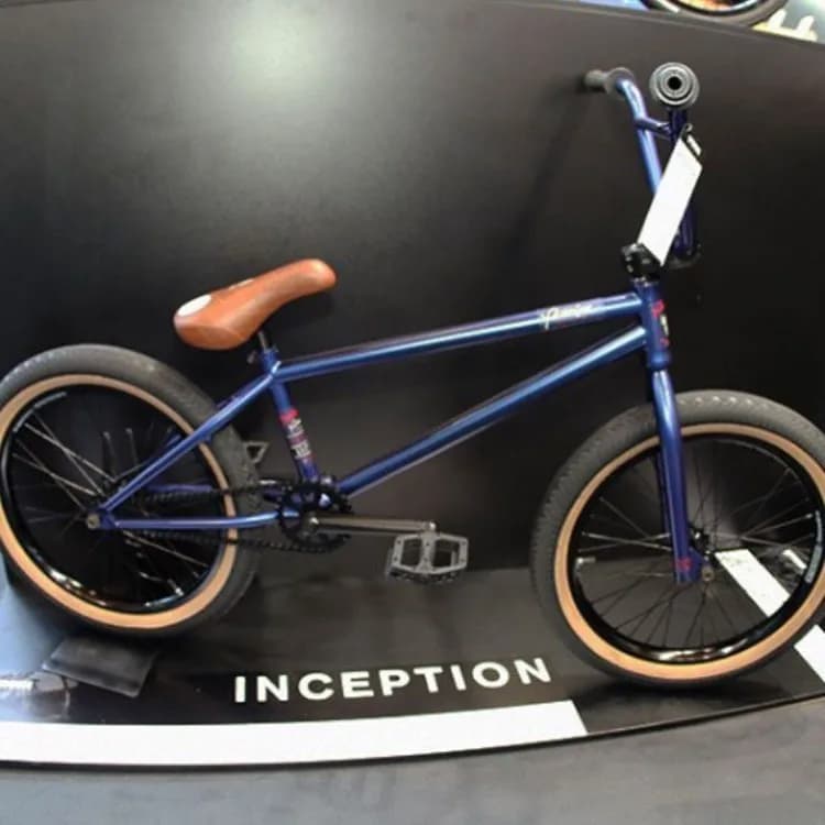 دوچرخه BMX مدل اینسپشن پریمیوم، رنگ آبی تیره و قهوه‌ای، جنس فلز و چرم، دوچرخه BMX تک‌سرعته