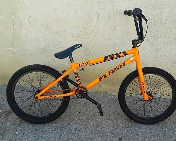 دوچرخه بیامایکس مدل BMX8 فلش، رنگ نارنجی و مشکی، جنس فلز، پلاستیک و لاستیک، دوچرخه کوهستان بیامایکس