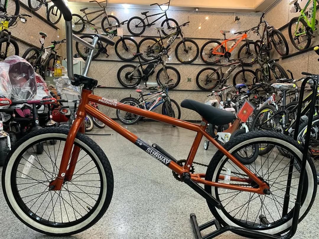 دوچرخه BMX، رنگ نارنجی، جنس فلز