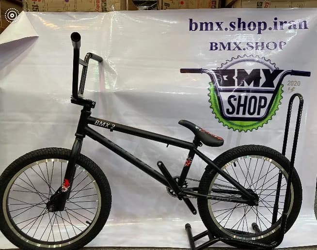 دوچرخه BMX مدل bmx2 سایز ۲۰، رنگ مشکی و سفید، جنس فلز و لاستیک