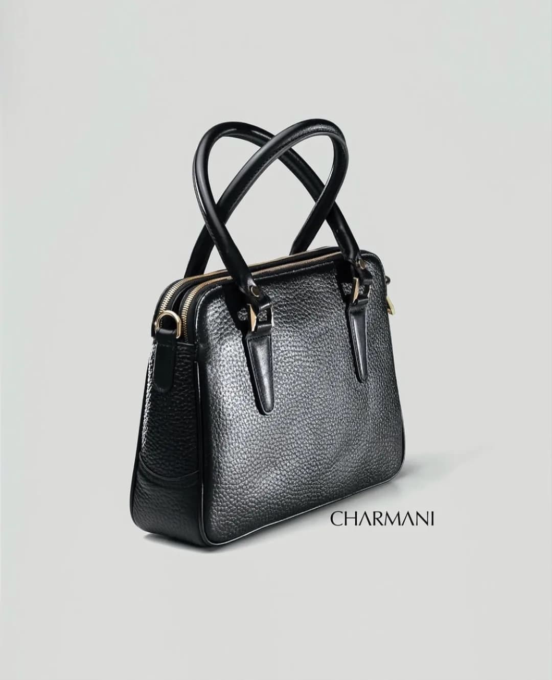 کیف چرمی زنانه مدل لیا Charmani، رنگ مشکی، دستی با دو بند
