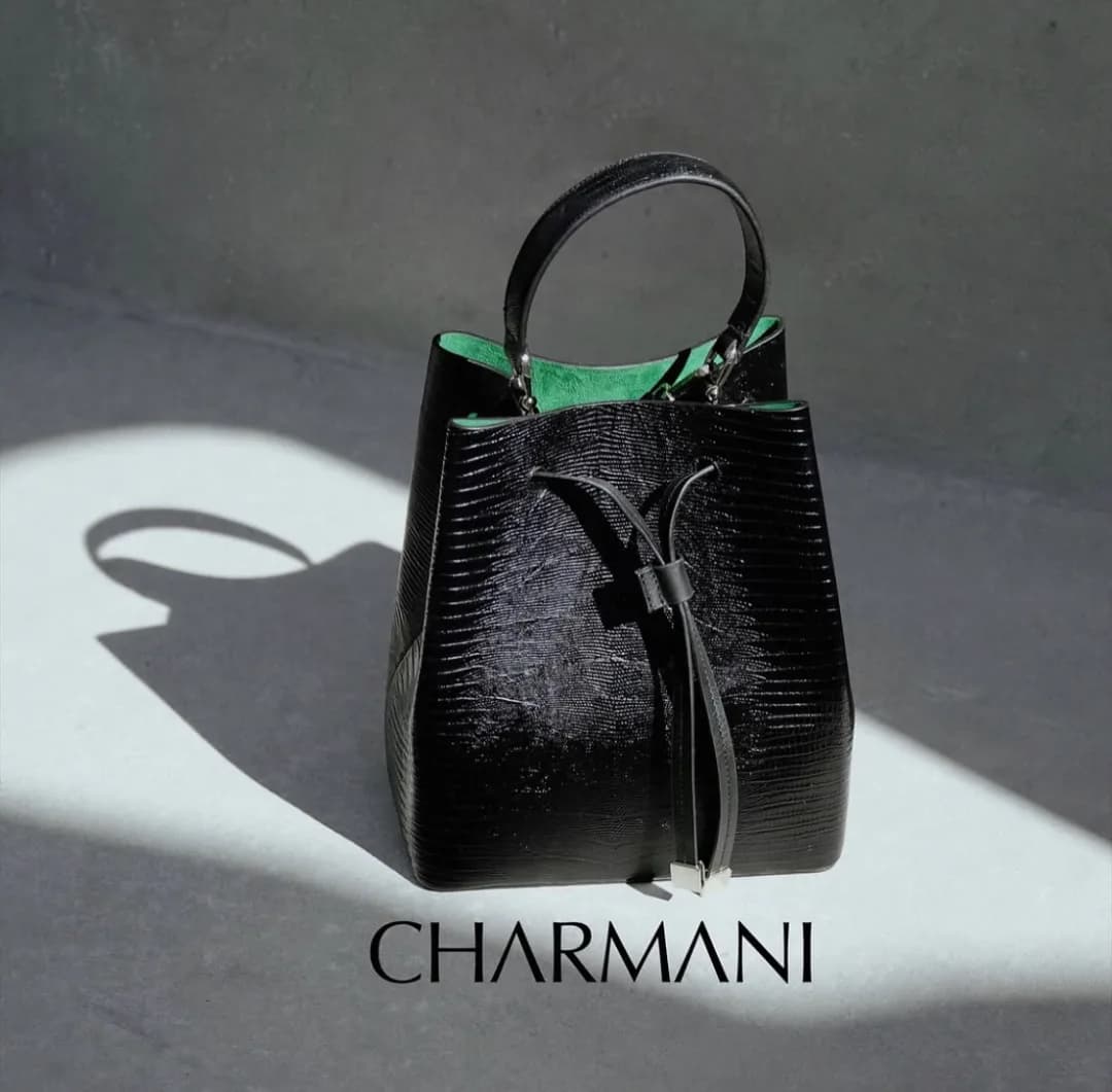 کیف دستی چرم زنانه چرمانی، رنگ مشکی و سبز، طرح پلنگی، کیسهای