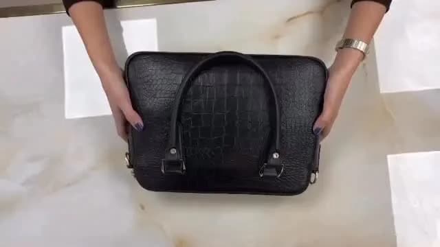 کیف زنانه، رنگ مشکی، جنس چرم، طرح پلنگی، دستی، مستطیلی