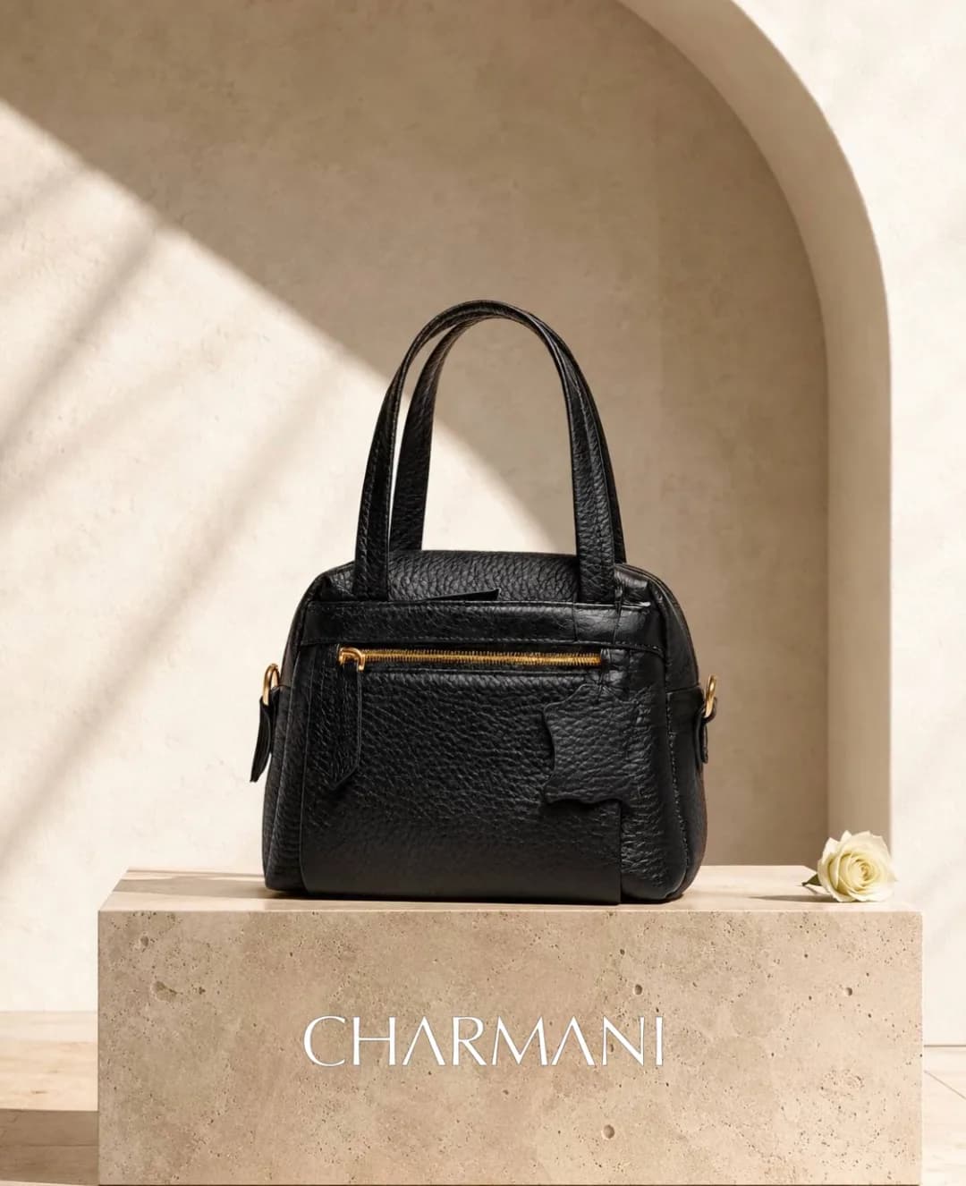 کیف دستی چرمی Charmani، رنگ مشکی و طلایی، زیپدار، مستطیلی