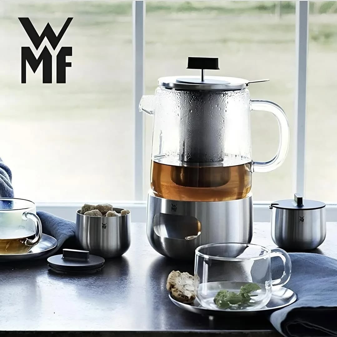 قوری وارمردار دبلیو ام اف SensiTea، رنگ شفاف و نقره‌ای، جنس شیشه و استیل، مدل فرانسوی با پایه