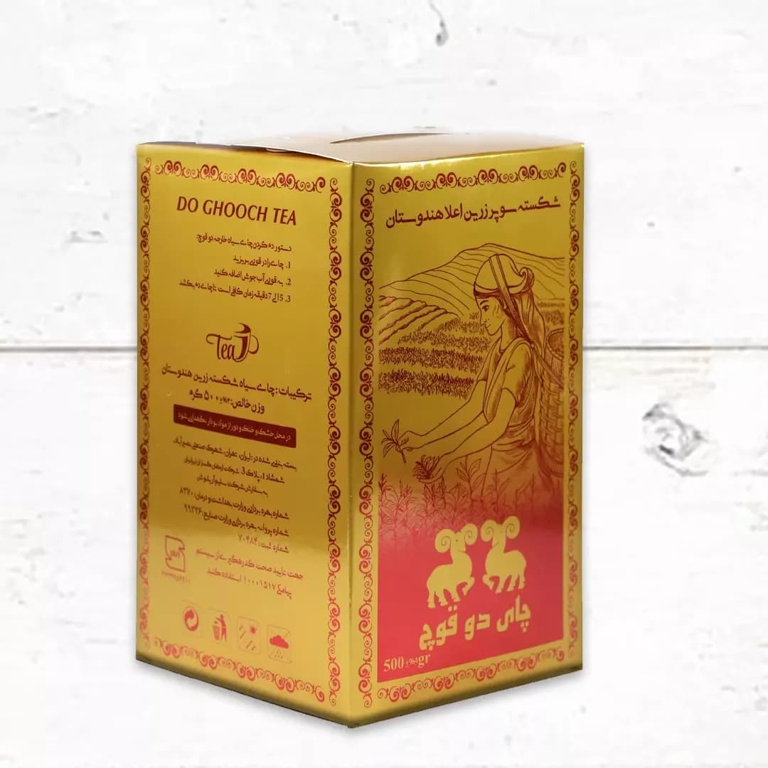 چای دو قوچ ۵۰۰ گرمی، رنگ طلایی و قرمز، جنس مقوا، جعبه مکعبی