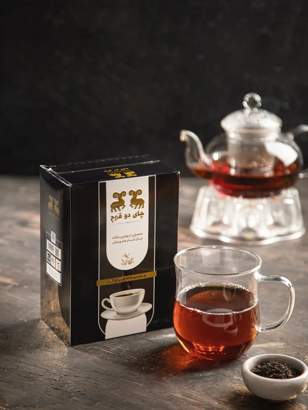 چای سیاه ارل گری با عطر برگاموت دوقوچ، رنگ مشکی و سفید، جنس مقوا، جعبه مستطیلی