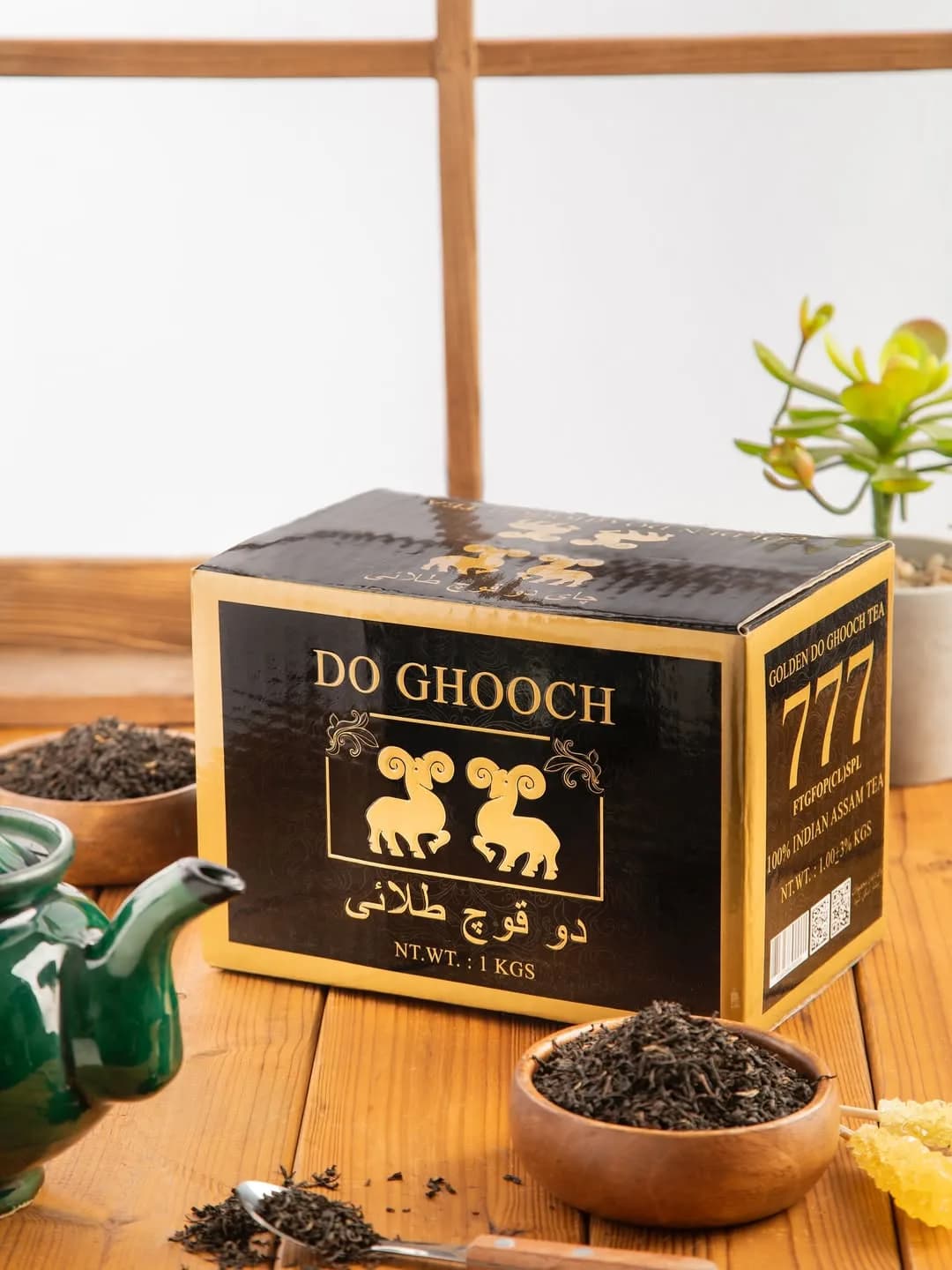 چای سیاه دوقوچ طلایی زرچای، رنگ مشکی، جنس مقوا، جعبه مکعبی