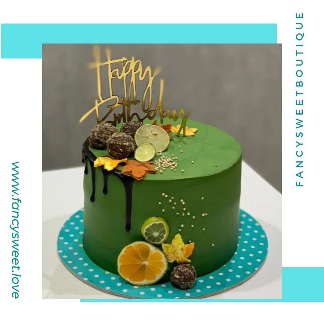 کیک تولد، رنگ سبز، زرد و نارنجی، استوانه‌ای