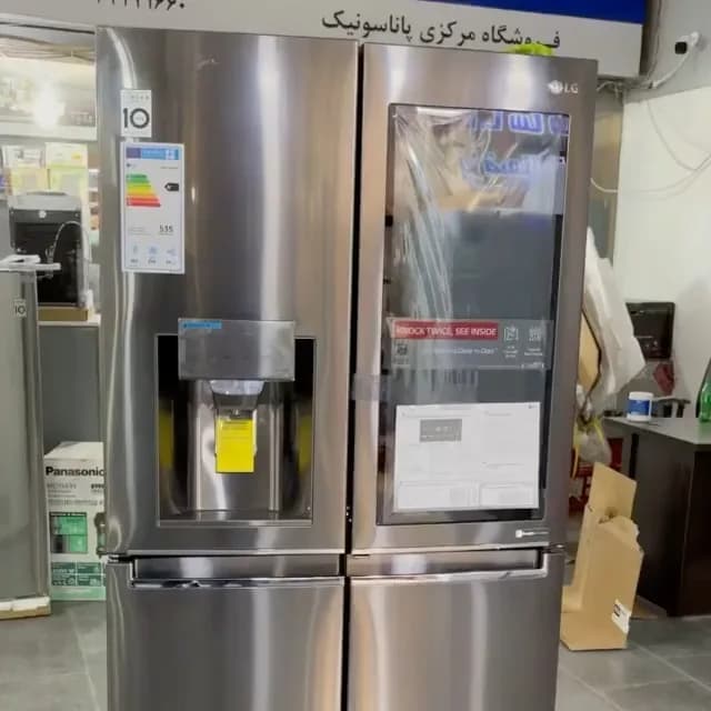 یخچال ساید بای ساید نکست مدل X334 ال‌جی، رنگ نقره‌ای، جنس استیل، دو در، آبسردکن‌دار