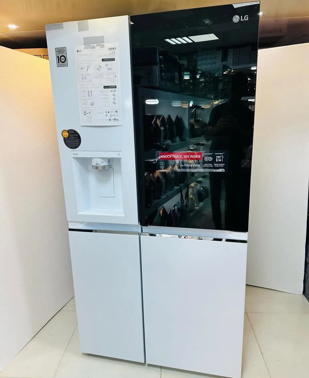 یخچال ساید بای ساید ۳۴ فوت مدل X348 الجی، رنگ سفید و مشکی، جنس استیل و شیشه، چهار درب، اینستاویو
