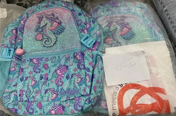 کوله پشتی اسمیگل، رنگ آبی، بنفش و صورتی، طرح شخصیت کارتونی