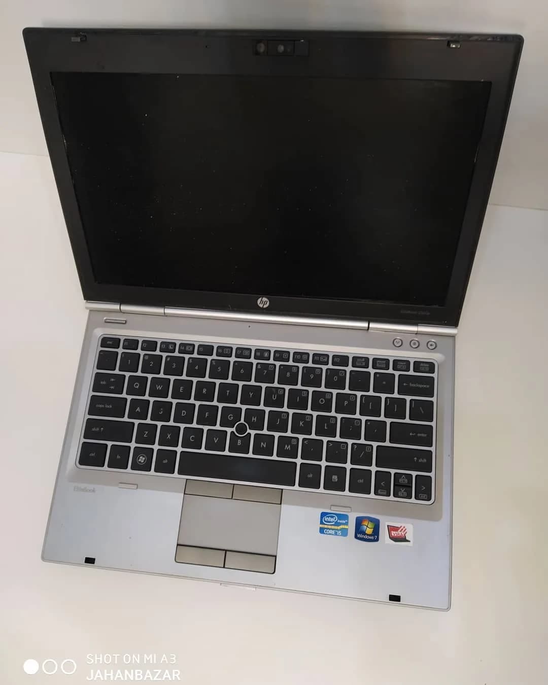 لپ تاپ HP EliteBook 2560p، رنگ نقرهای و مشکی، جنس فلز و پلاستیک، صفحه نمایش باز