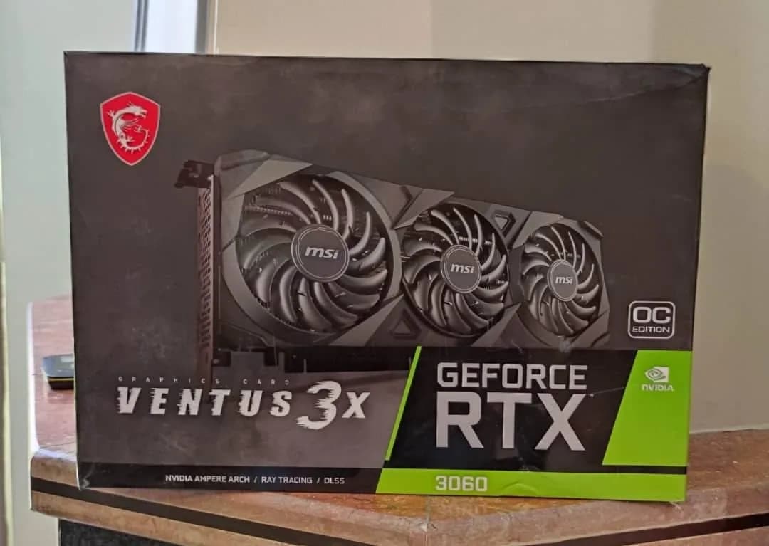 کارت گرافیک MSI RTX 3060 VENTUS 3X OC ام اس آی، رنگ مشکی و سبز، جنس مقوا، طرح تصویر کالا، جعبه سختافزاری