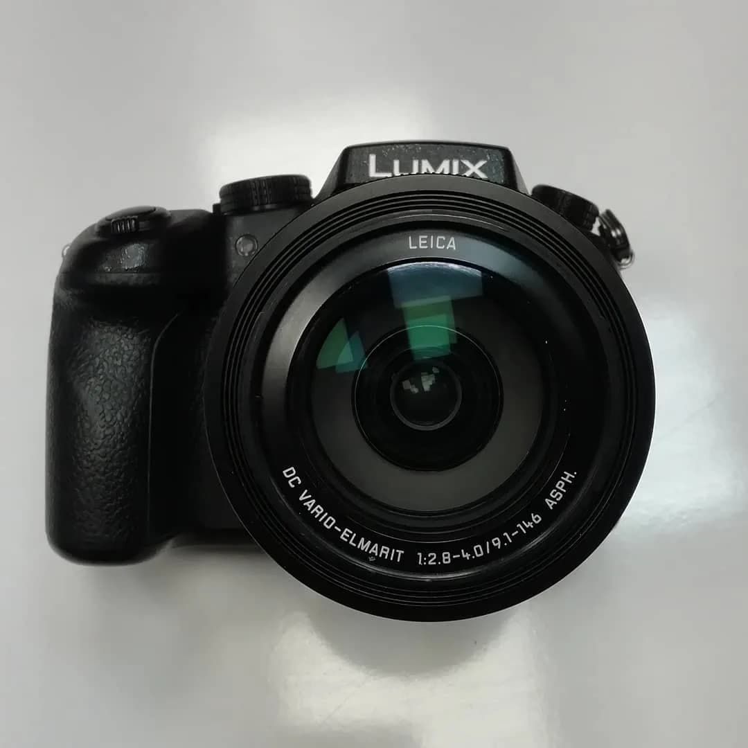 دوربین DMC-FZ1000 کارکرده پاناسونیک، رنگ مشکی، جنس پلاستیک و فلز، بدون آینه، لنز متصل