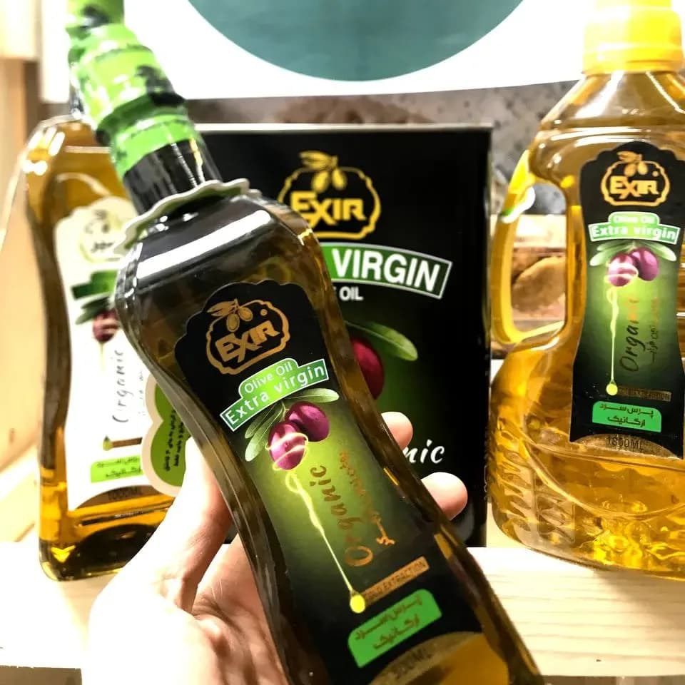 روغن زیتون فرابکر ارگانیک ۵۰۰ میلی‌لیتر اکسیر، رنگ زرد و سبز، جنس شیشه، بطری