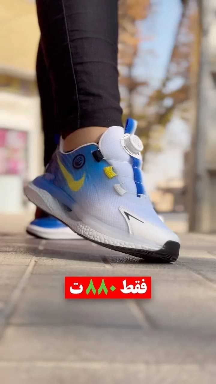 کتانی بندچرخی سفید و آبی و زرد نایکی، بنددار