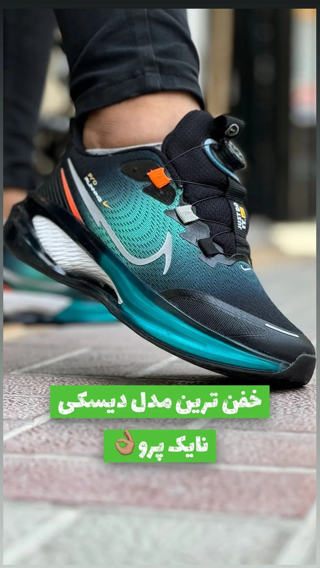 کتانی بندچرخی سبزآبی و مشکی نایکی، رنگ نارنجی، پاشنه تخت