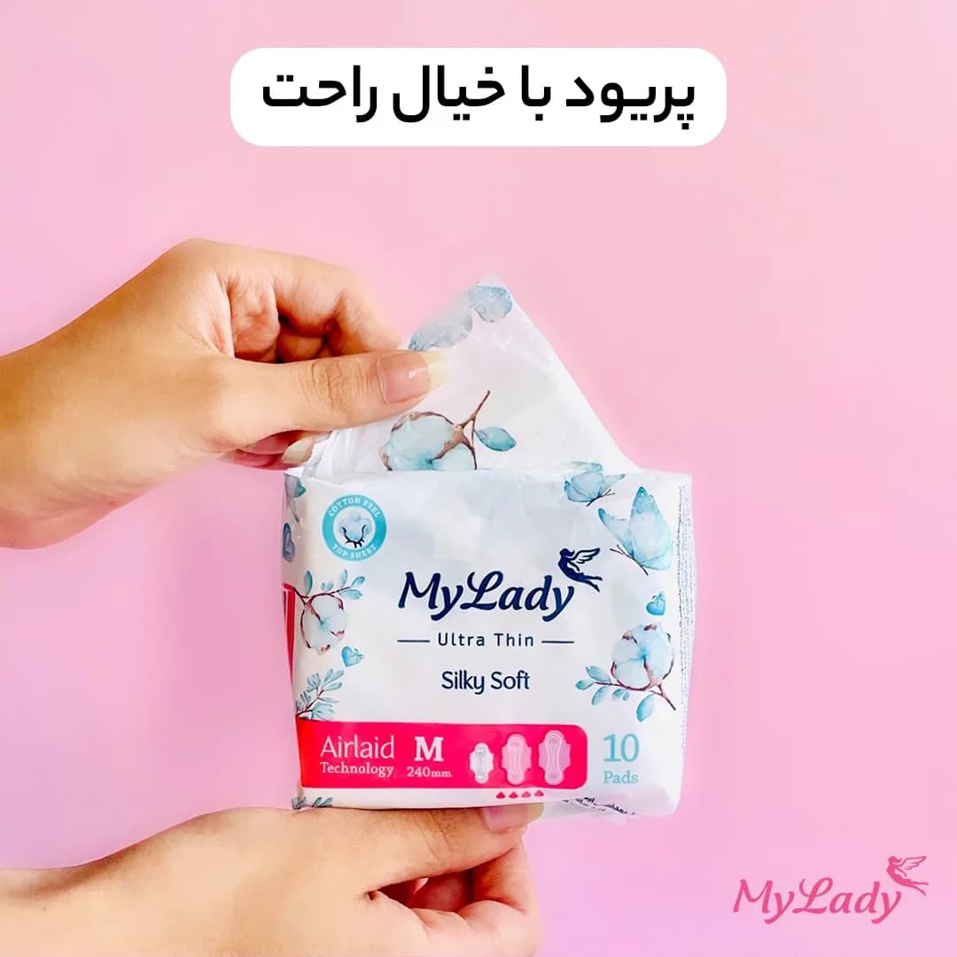 نوار بهداشتی مای لیدی، رنگ سفید و آبی، جنس پلاستیک و پنبه، طرح گلدار، بستهبندی نوار بهداشتی