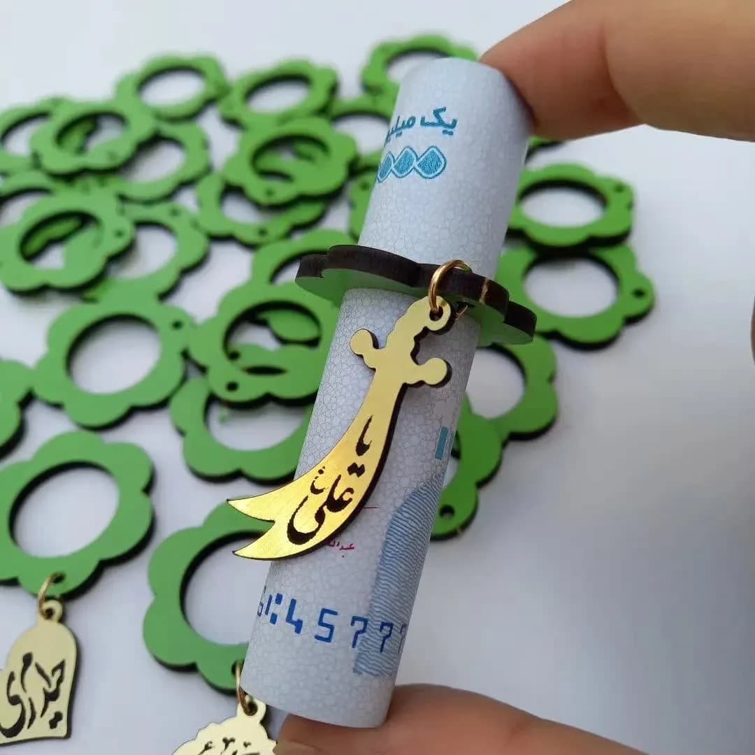 حلقه اسکناس طرح گل — رنگ سبز — نمای دردست — طرح گل