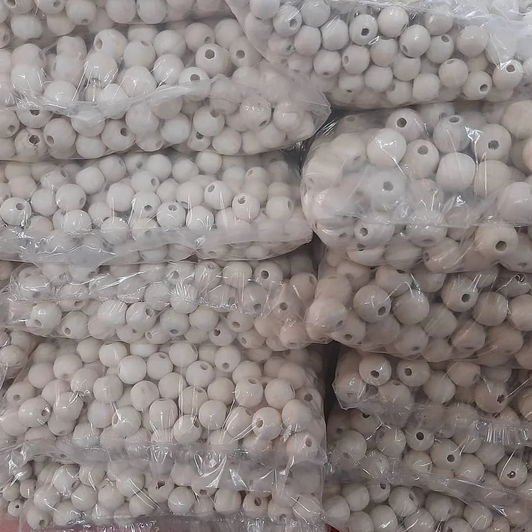 مهره چوبی بدون رنگ ۷ سایز — رنگ کرم — نمای بستهبندی — ۷ سایز
