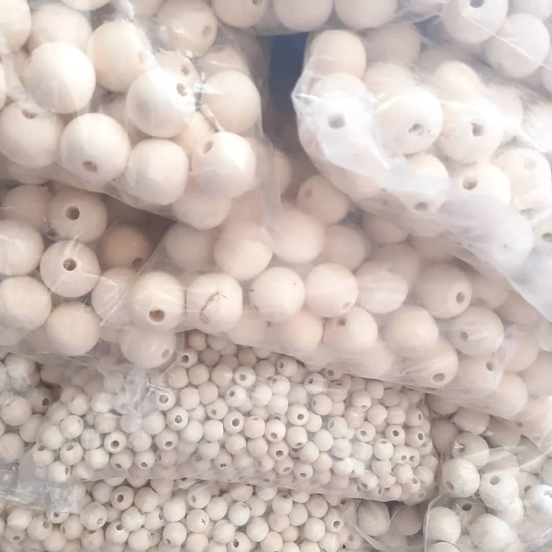 مهره چوبی ۸ تا ۲۴ میل — رنگ کرم — نمای بستهبندی — سایزهای ۸ تا ۲۰