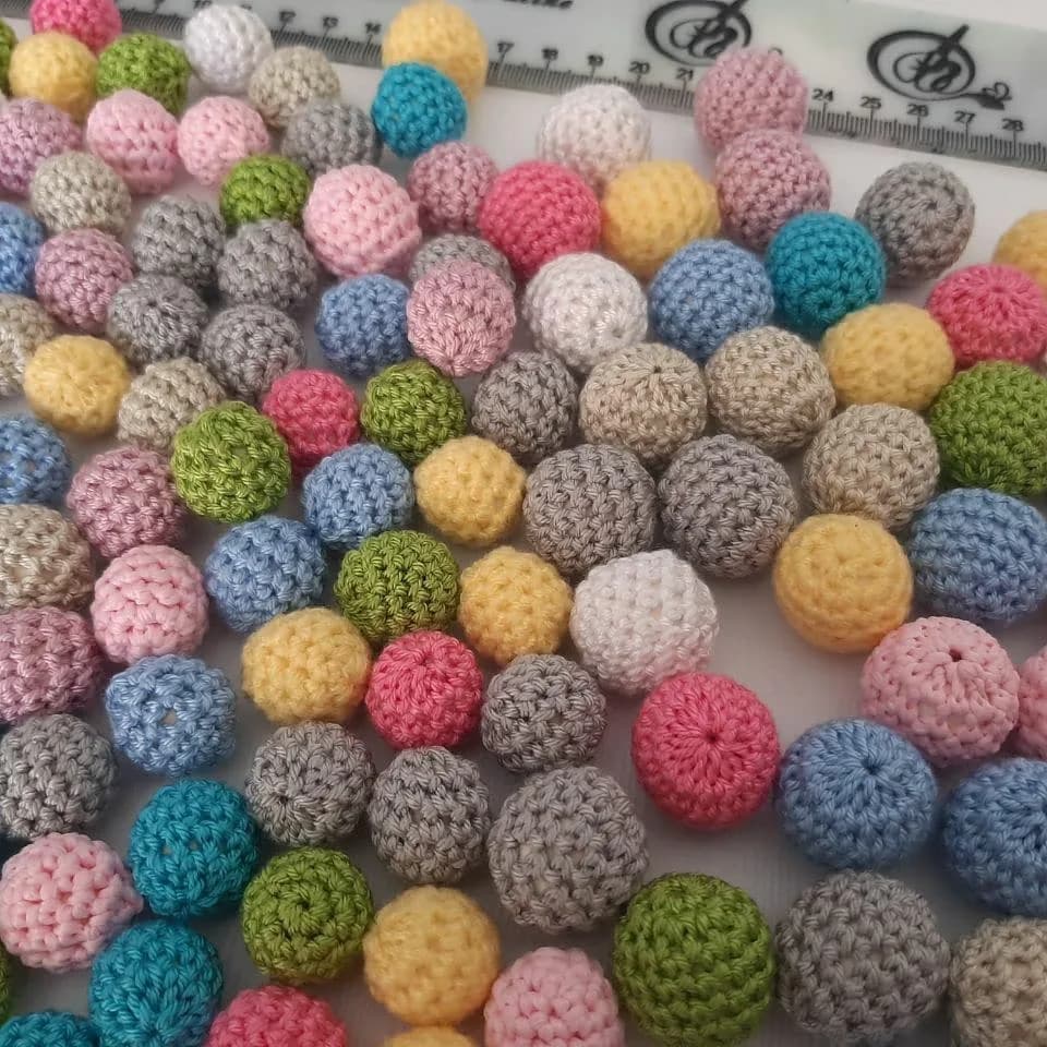 پک ده عددی مهره قلاببافی — نمای دردست — ده عددی