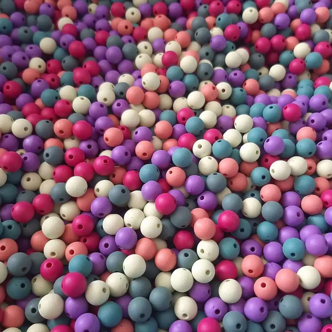 مهره طرح اونیکس رنگارنگ — نمای در‌دست — بسته ۱۰۰ و ۵۰۰ گرمی