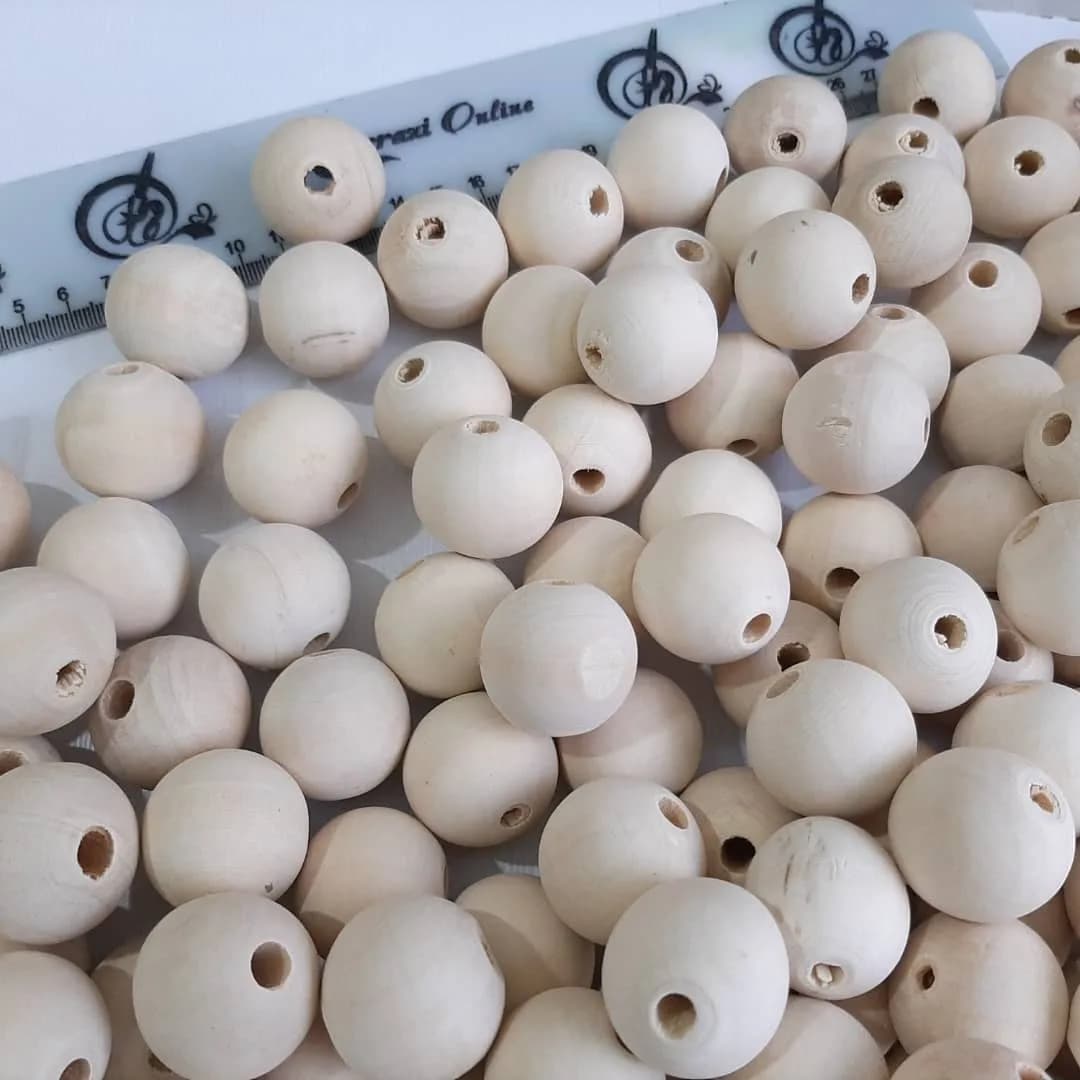 مهره چوبی ۲۸ میل — رنگ کرم — نمای دردست — ۲۸ میل