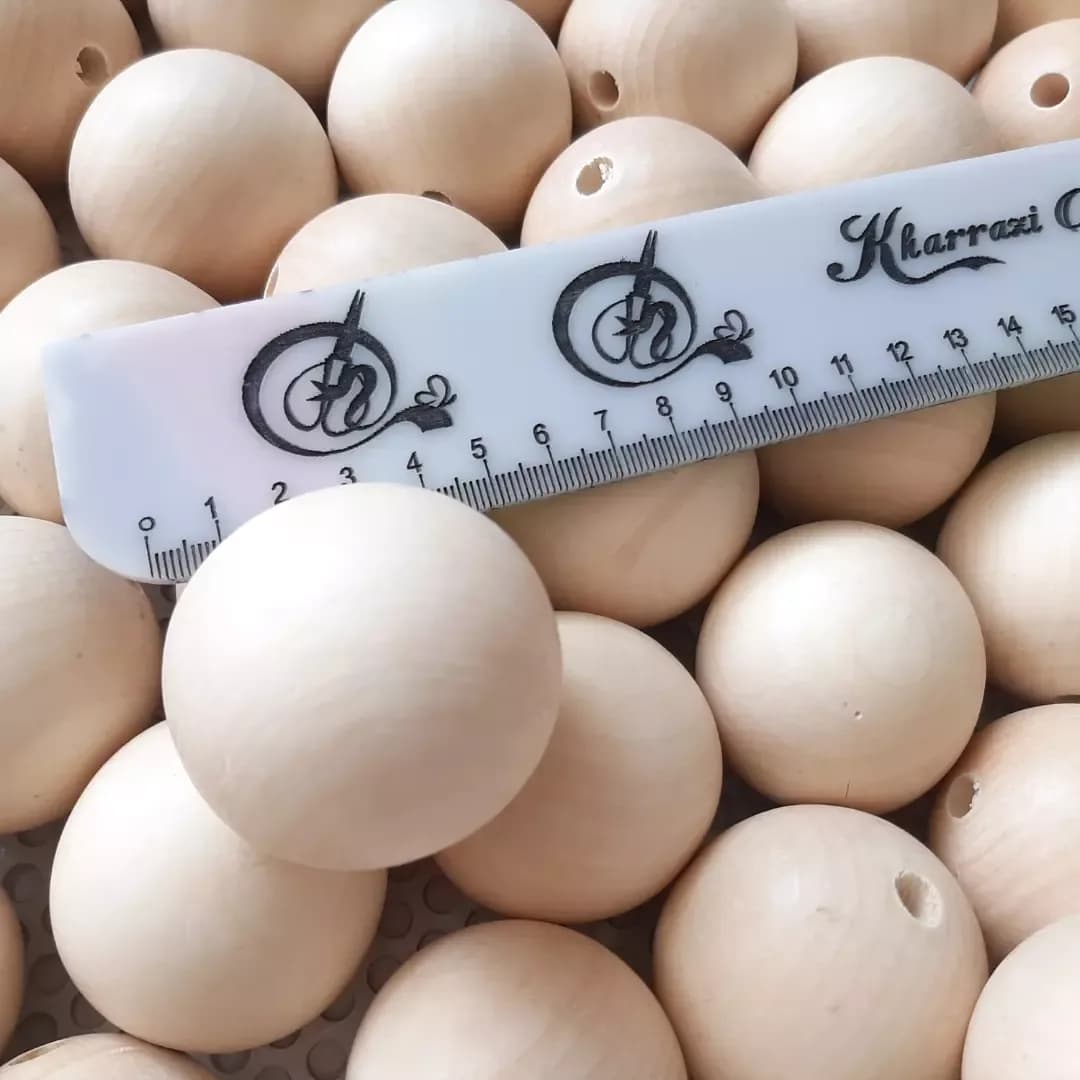 مهره چوبی ۵۰ میل — رنگ کرم — نمای دردست — ۵۰ میل