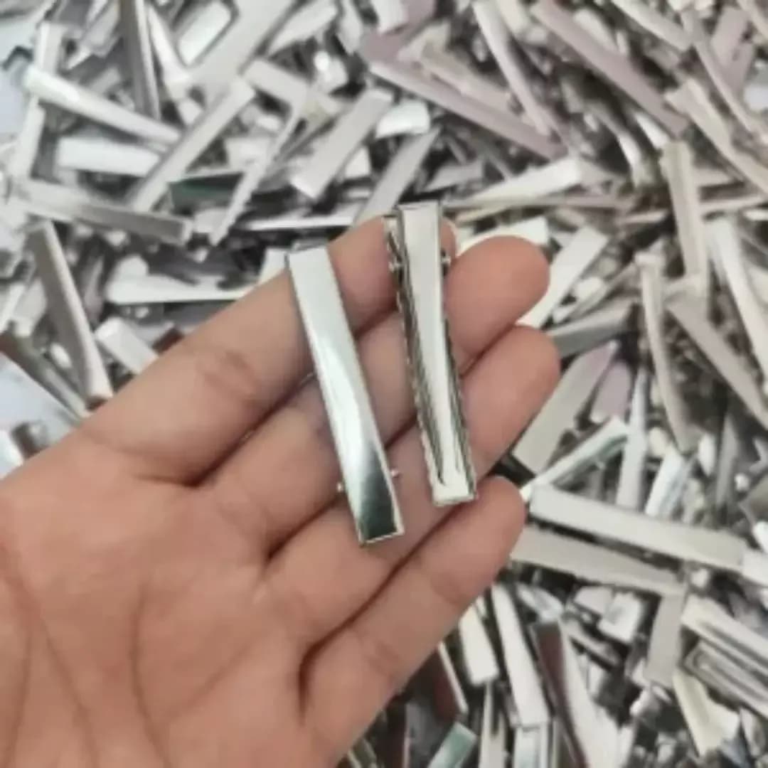 گیره‌ی انبری — رنگ نقره‌ای — نمای در‌دست — ۴ سایز