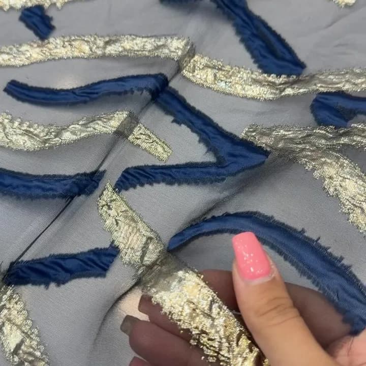 پارچه ژاکارد اورگانزا کره ای، رنگ آبی، طلایی و خاکستری، جنس توری، پارچه متری