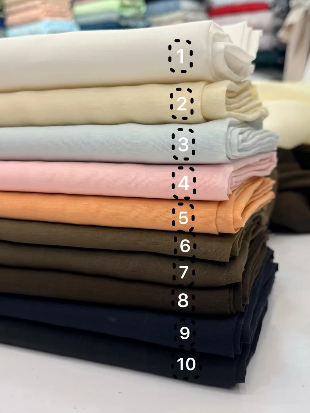 پارچه پری شیشه‌ای گلس عرض ۱۵۰ — رنگ کرم — نمای چندکالا — ۱۰ رنگ