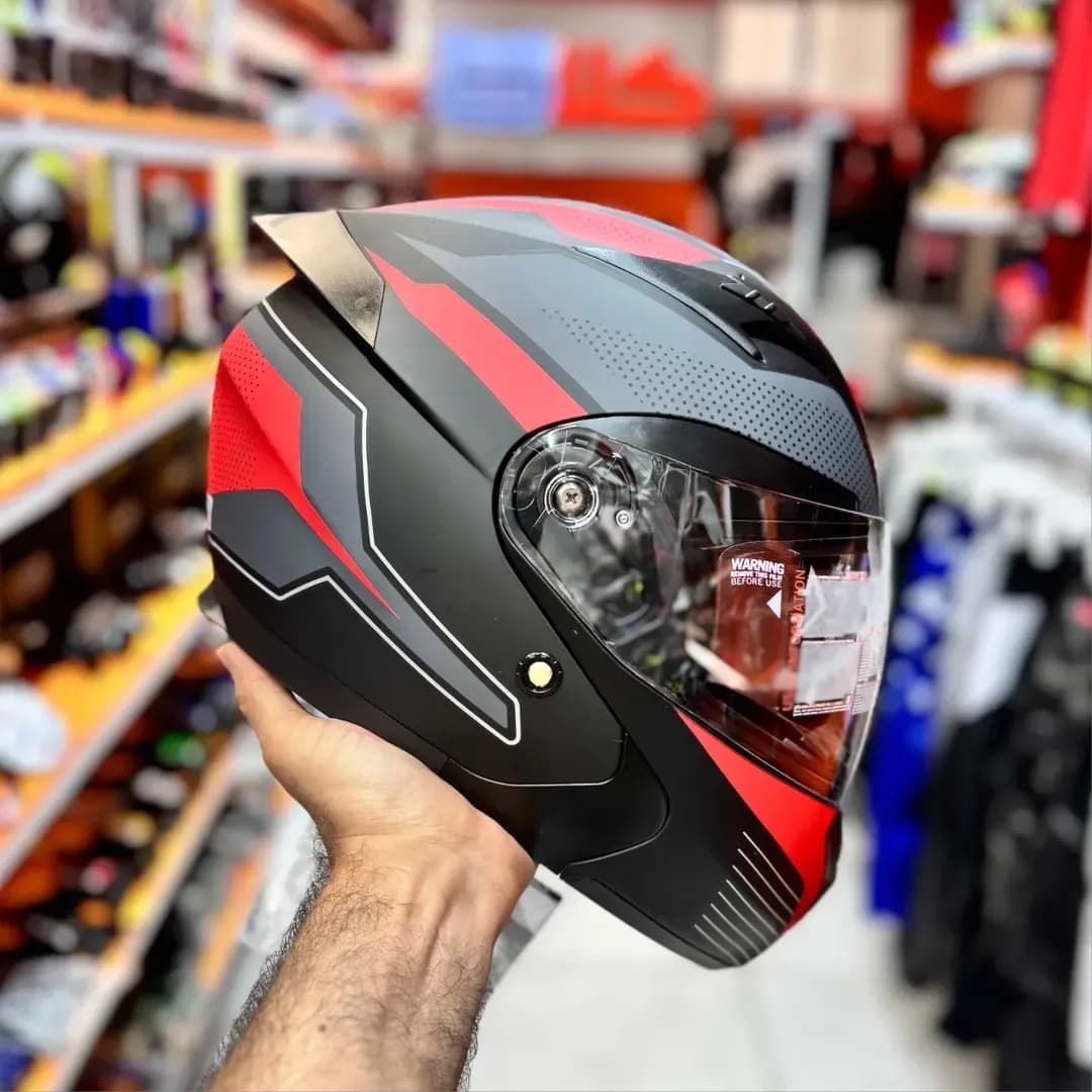 کلاه کاسکت فک متحرک مدل 906، رنگ مشکی و قرمز، جنس پلاستیک، طرح هندسی، تمام صورت، شیشه دار