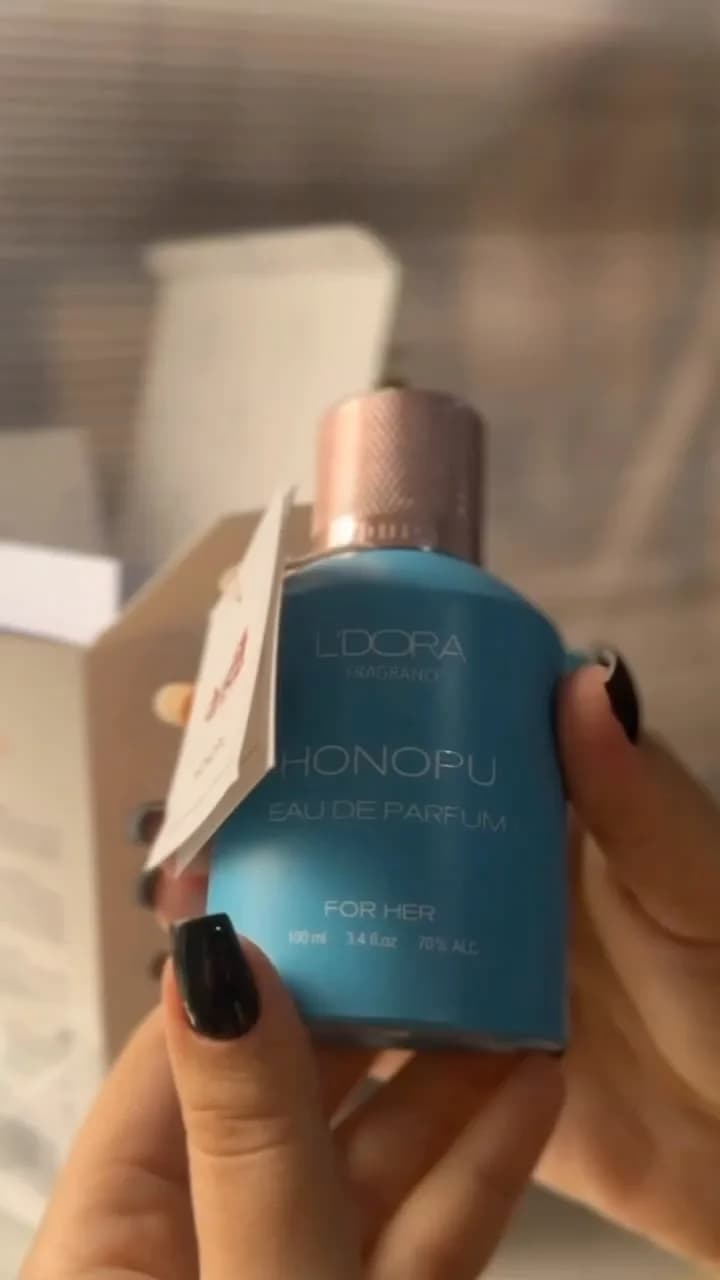 عطر هونوپو لدورا، رنگ آبی و مسی، جنس شیشه و فلز، بطری اسپری