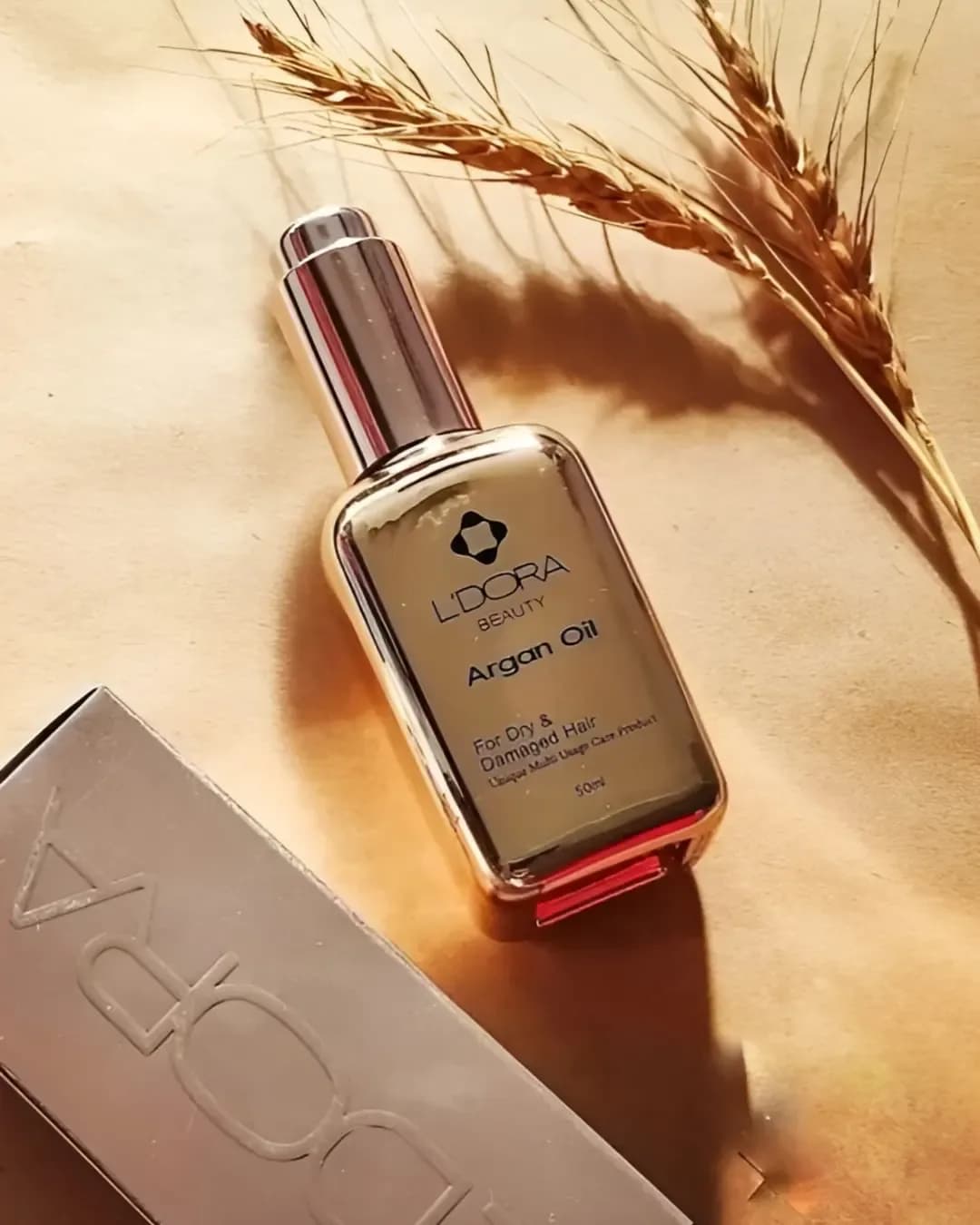 روغن آرگان لدورا، رنگ طلایی و شفاف، جنس شیشه و فلز، بطری پمپی