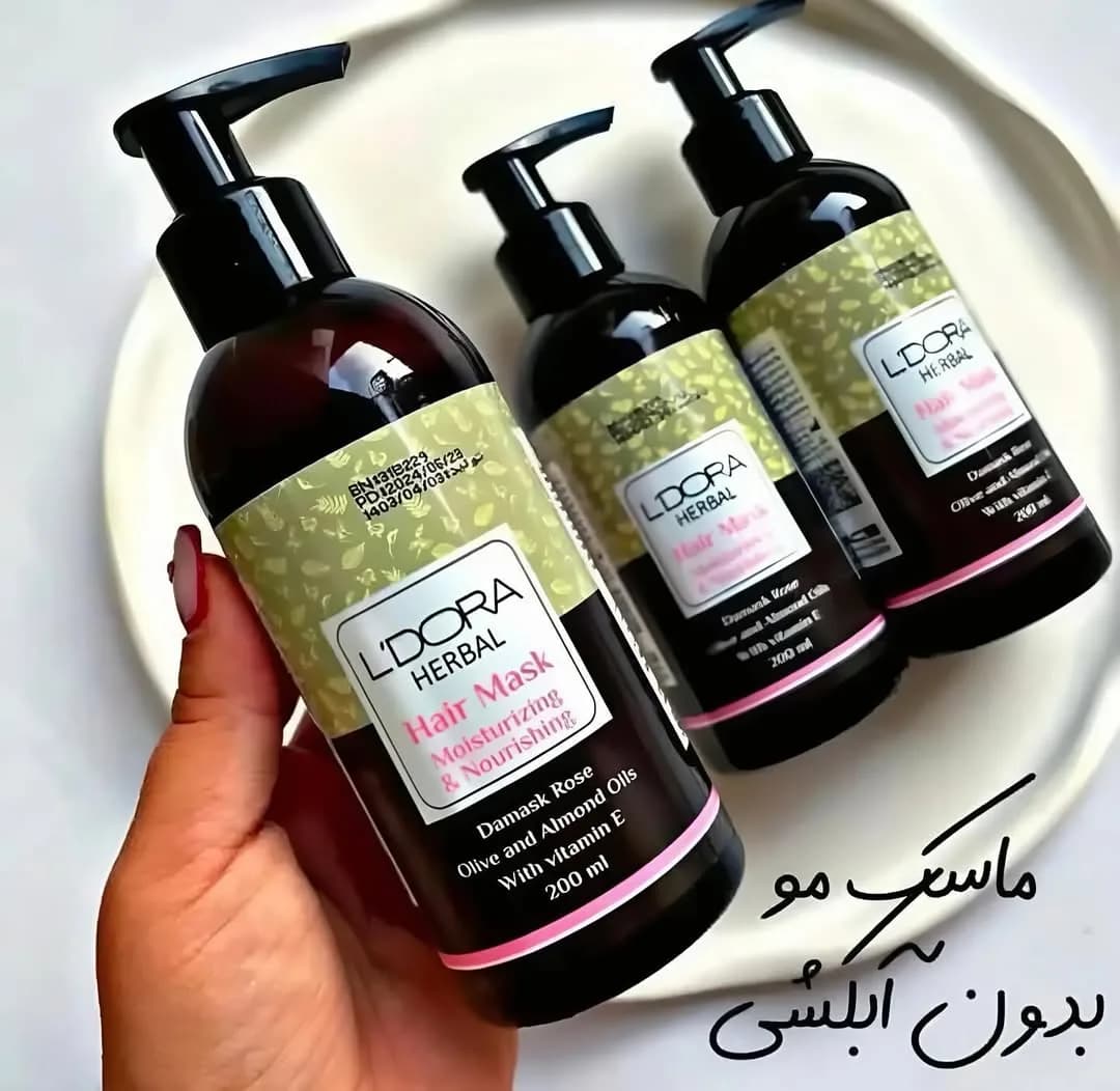 ماسک مو بدون آبکشی لدورا هربال، رنگ قهوه‌ای تیره، سبز و صورتی، جنس پلاستیک، بطری پمپی