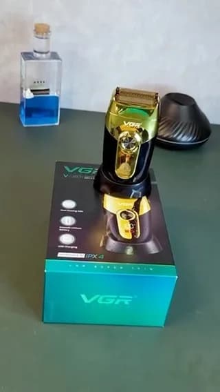 ماشین اصلاح صورت، رنگ مشکی، طلایی و سبز، جنس پلاستیک و فلز، ماشین اصلاح برقی