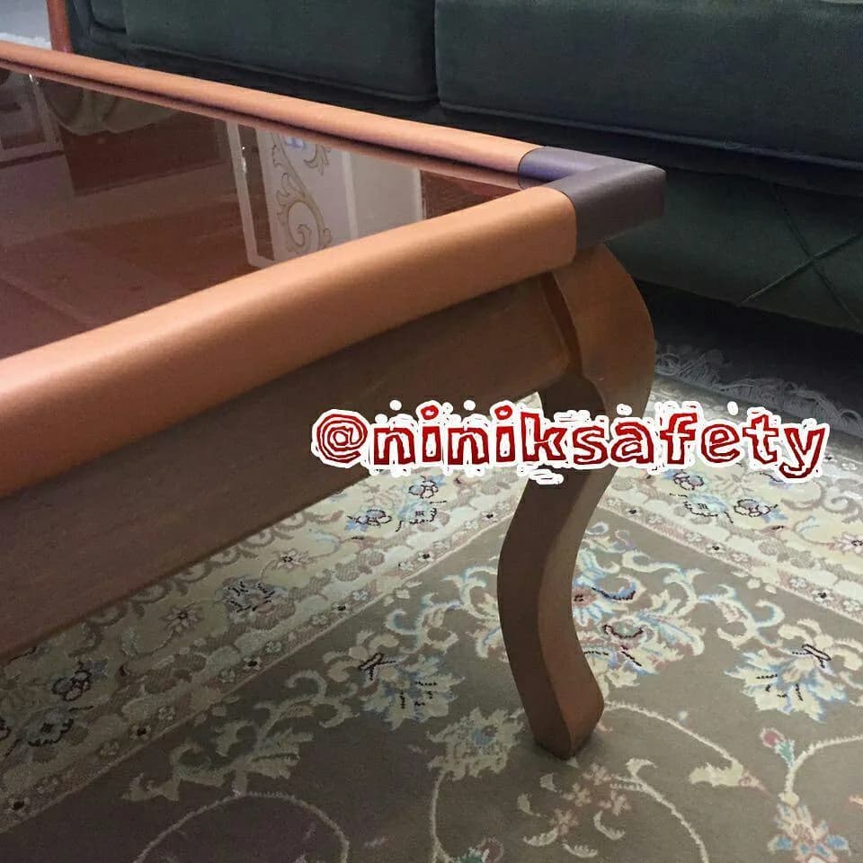 محافظ گوشه و لبه میز نی نی ک، رنگ قهوه‌ای، جنس پلاستیک و فوم، محافظ لبه