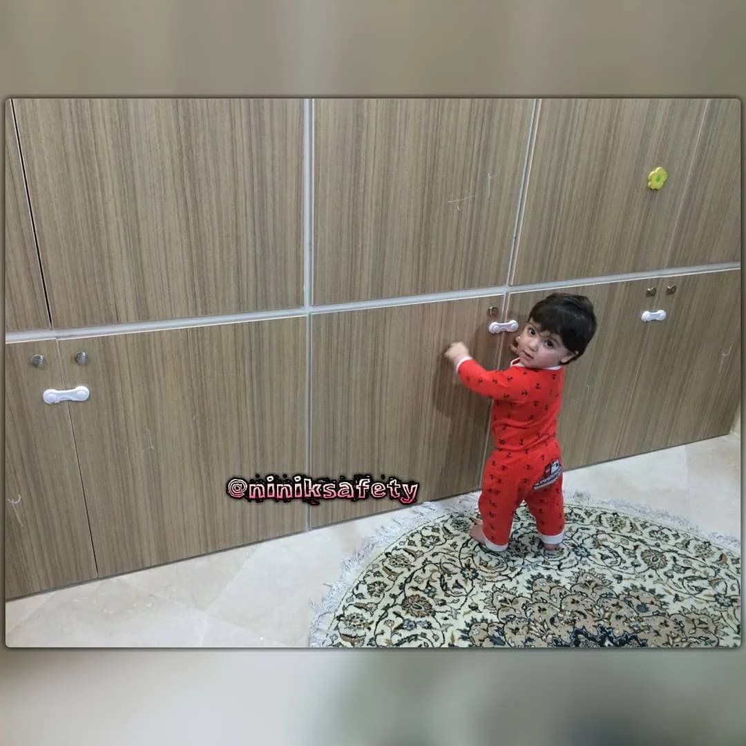 قفل کمد نی نی ک، رنگ سفید، جنس پلاستیک، گیره‌ای