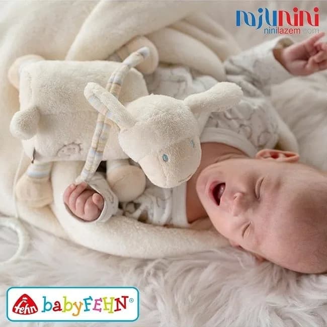 عروسک نخ کش موزیکال بره بی بی فن، رنگ کرم و سفید، جنس پارچه، عروسک پولیشی